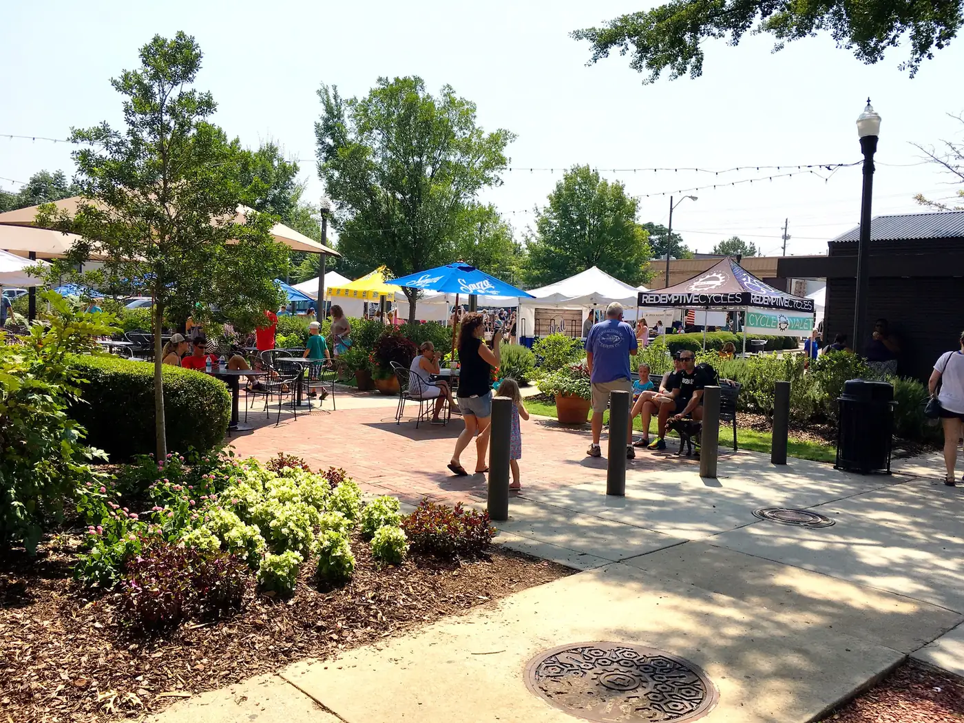 Shoppers and vendor tents at the Pepper Place Market in Birmingham's Lakeview district