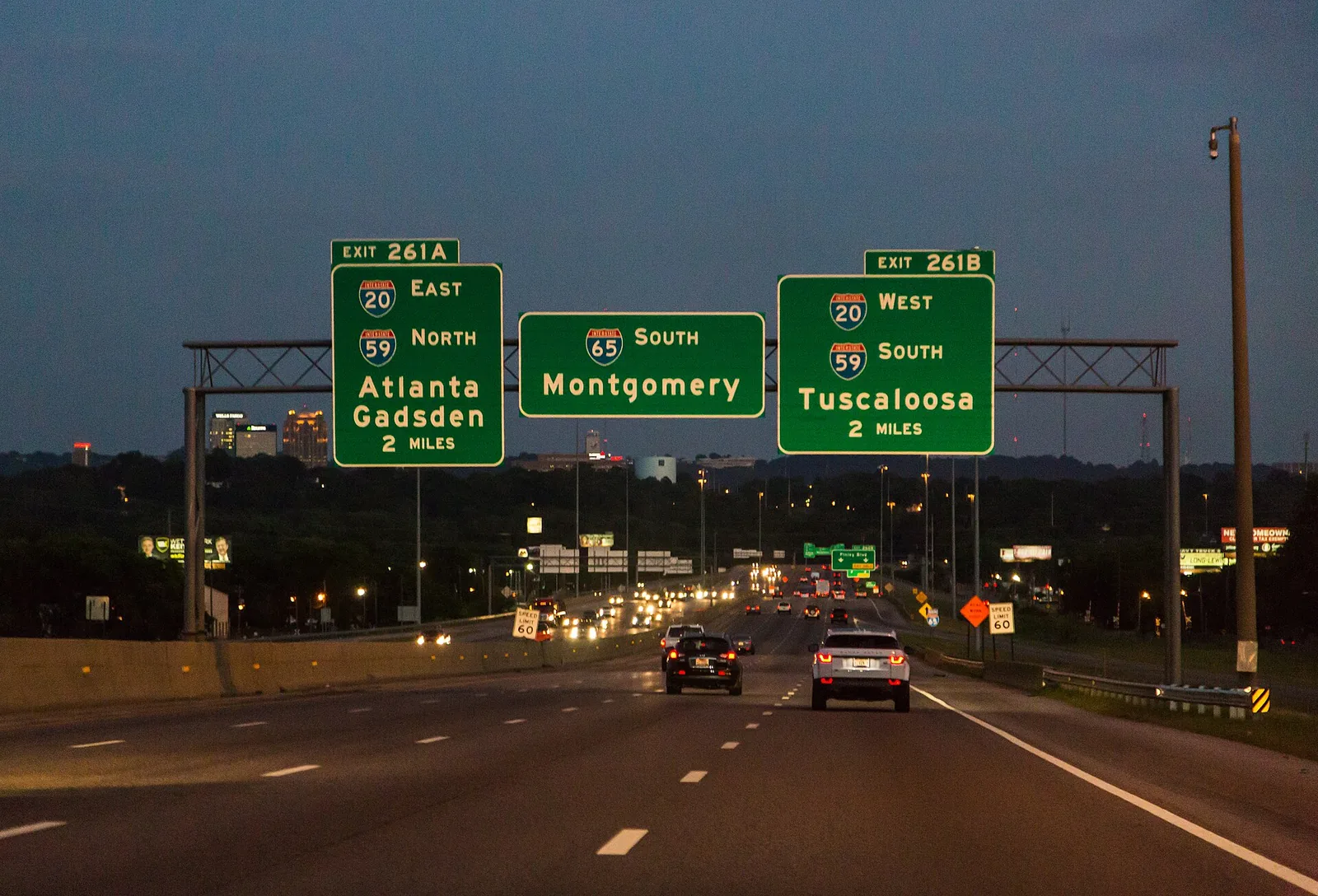 Overhead signs on Interstate 65 in Birmingham at dusk