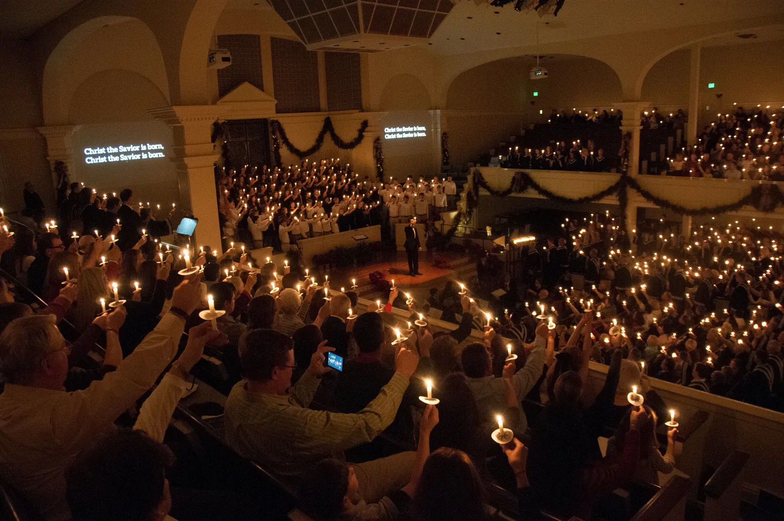 Worshippers hold candles during the Candlelight at Dawson Christmas service at Dawson Memorial Baptist Church in Homewood.