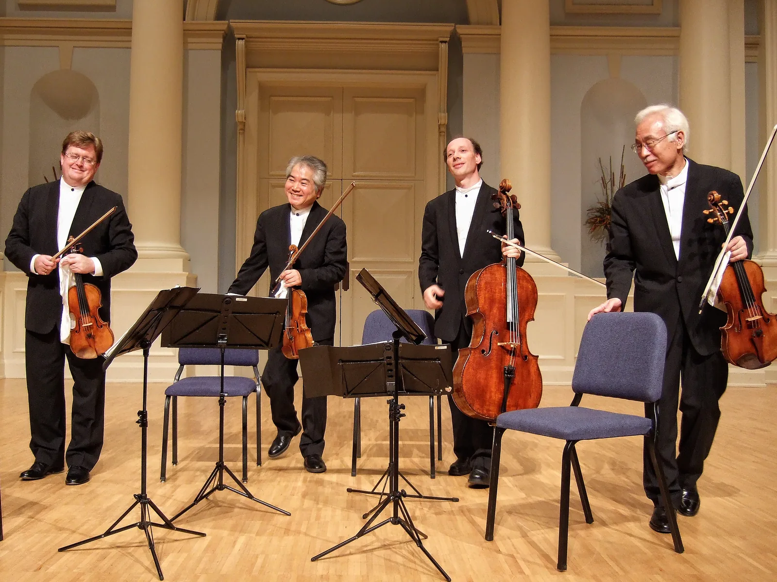 The Tokyo String Quartet on stage with their instruments at Samford University in Homewood.