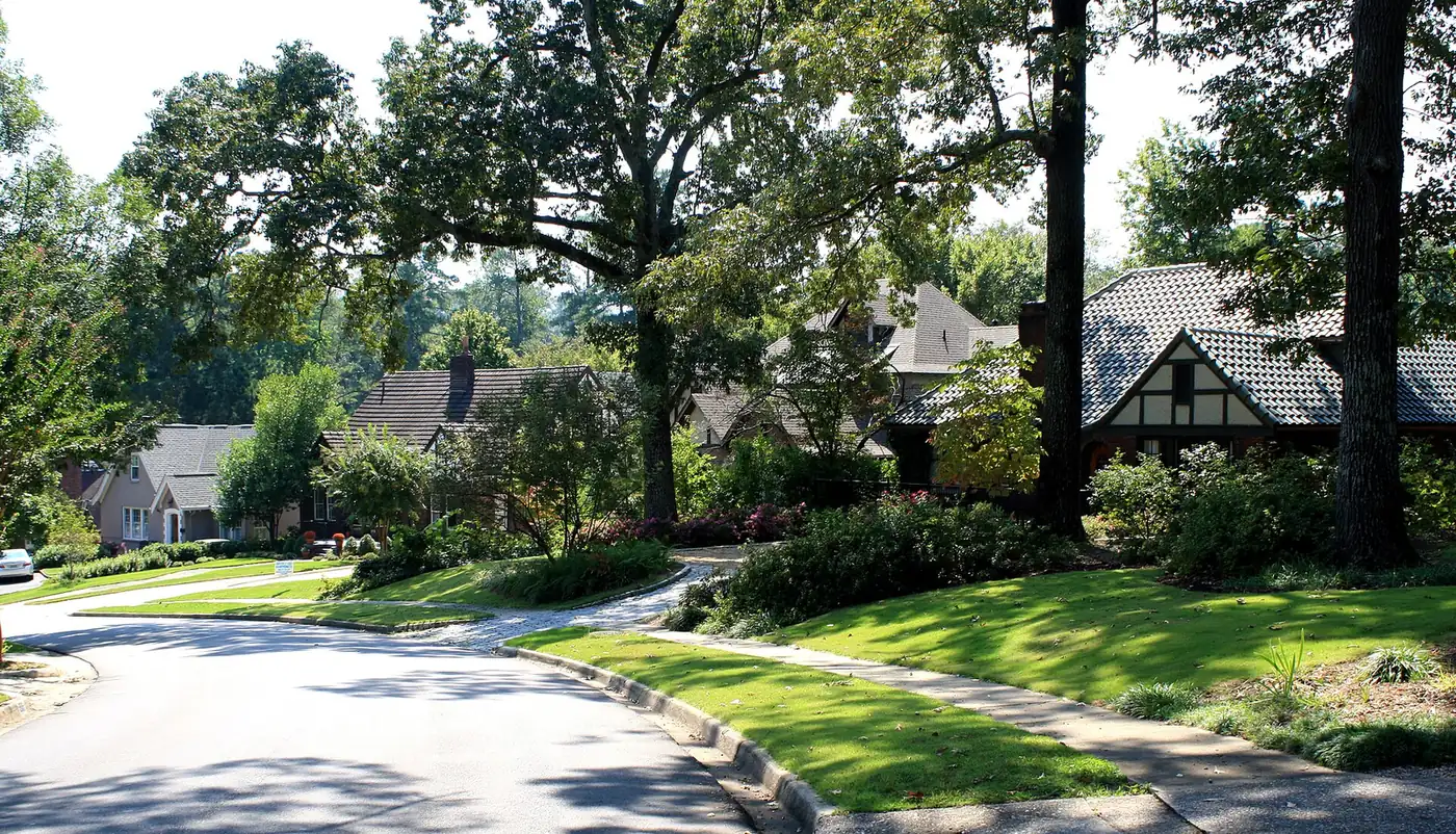 Tudor Revival houses and a curving street in Homewood's Hollywood neighborhood
