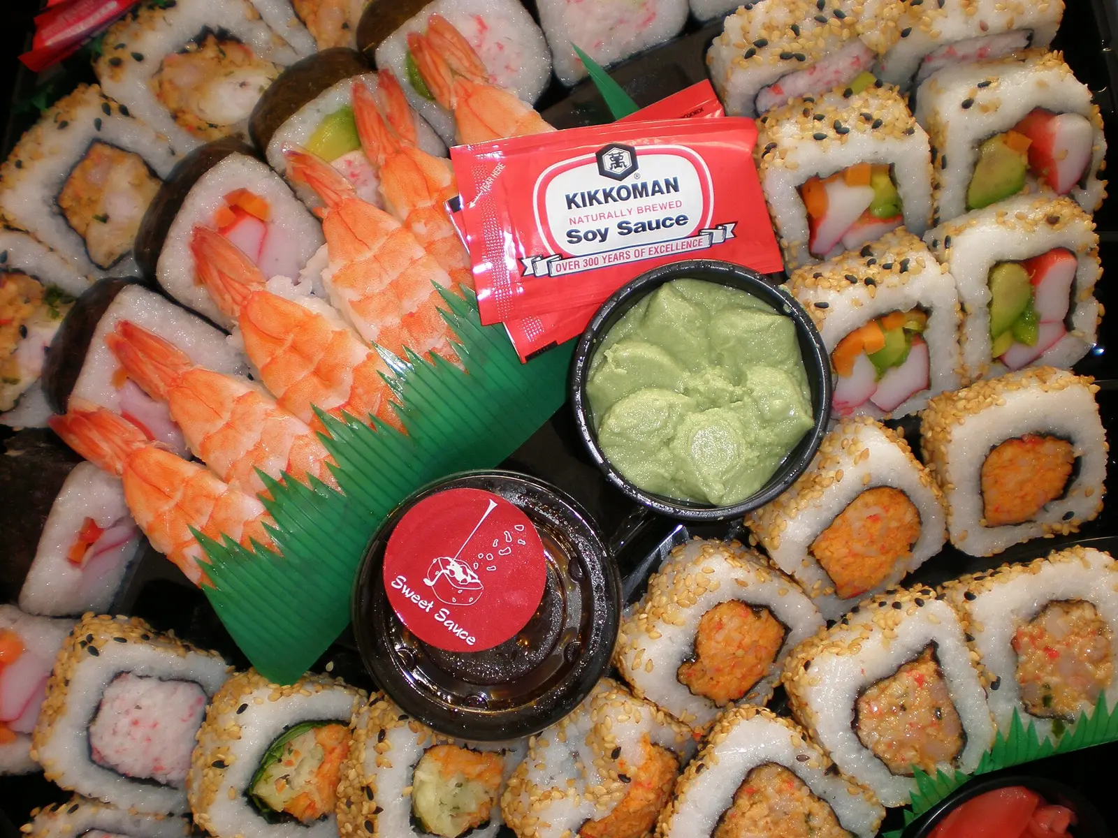 A platter of assorted sushi rolls and nigiri.