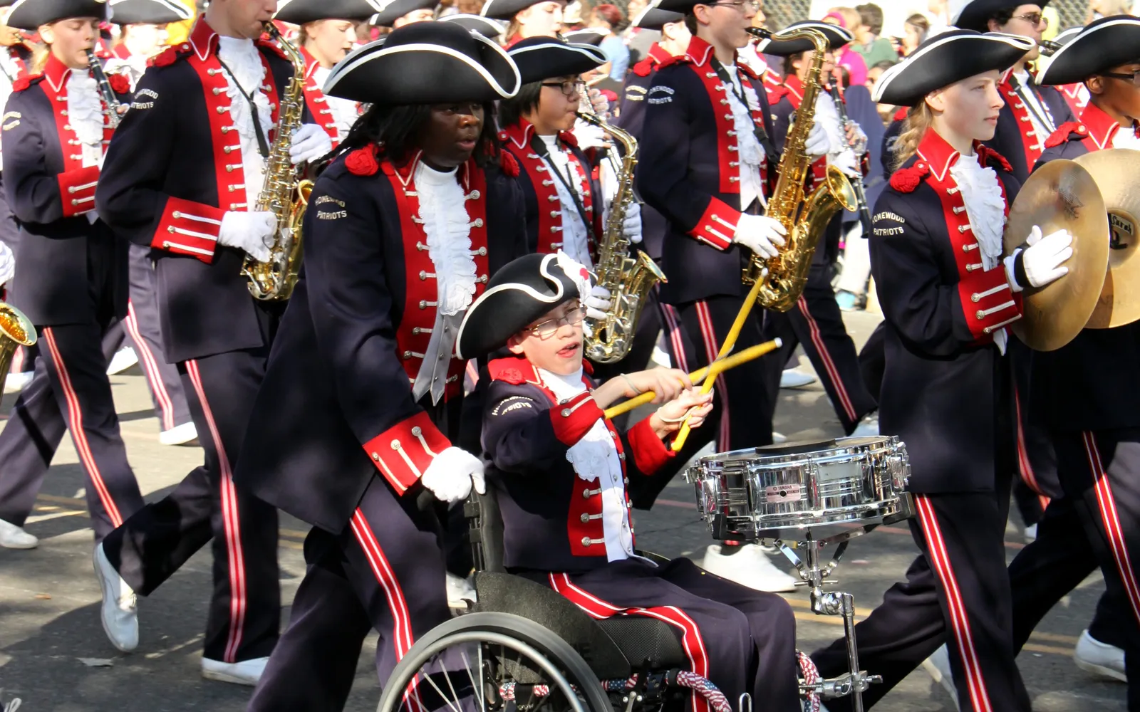 Members of the Homewood High School Patriots Marching Band, whose program the festival's wristband sales benefit, on parade in Pasadena, California.