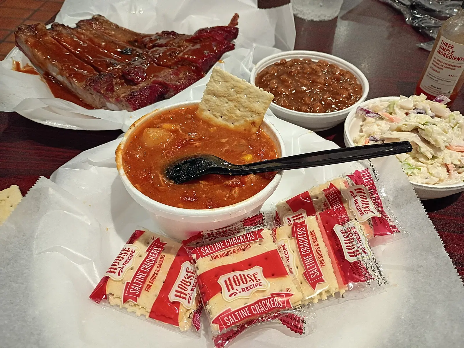 Ribs, barbecue beans, coleslaw and Brunswick stew with crackers at a barbecue restaurant on U.S. 280 in Birmingham.