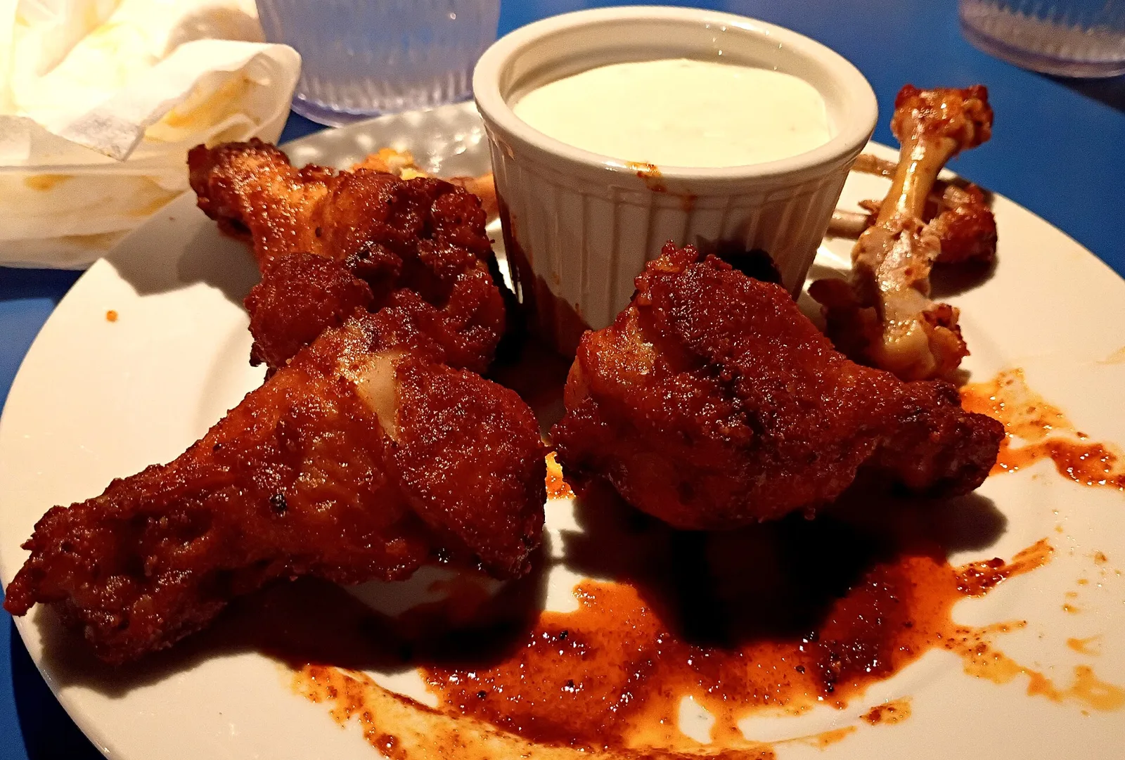 A plate of six baked wings with ranch at a pizzeria in Baton Rouge, La.
